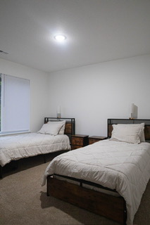 Bedroom view with dressers